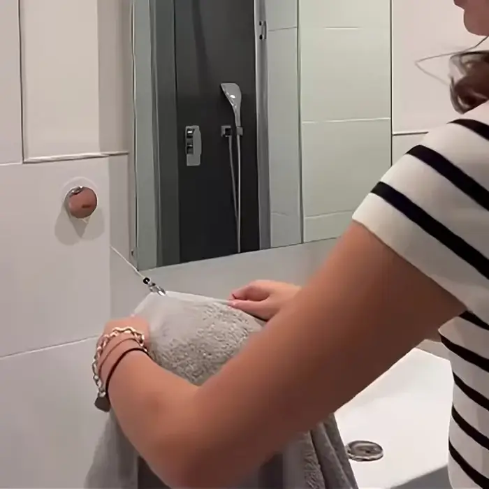 Porte-serviettes rétractable automatique