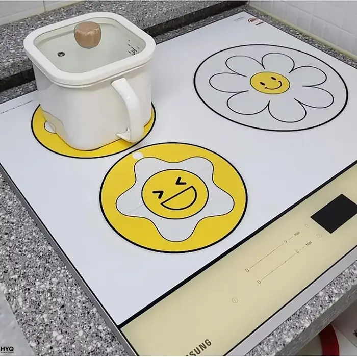 Tapis de protection pour induction