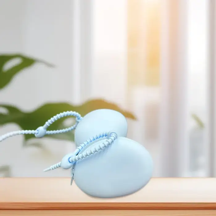 Étui de rangement en silicone – une pochette portable de type portefeuille, idéale pour les petits objets tels que les écouteurs, les câbles de charge, les monnaies.