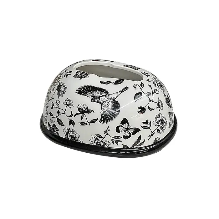 Boîte à mouchoirs en céramique avec cadeau à la main