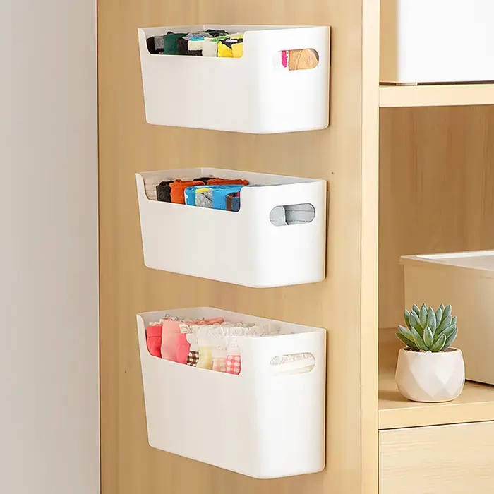 Boîte de rangement pour porte d'armoire